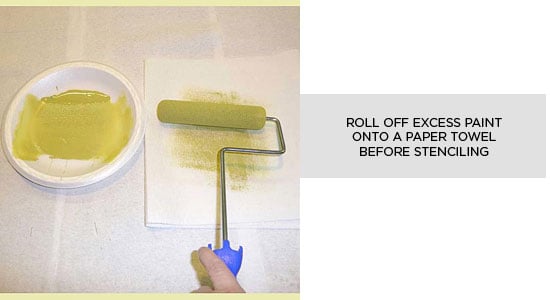 Remove excess paint onto a paper towel before stenciling