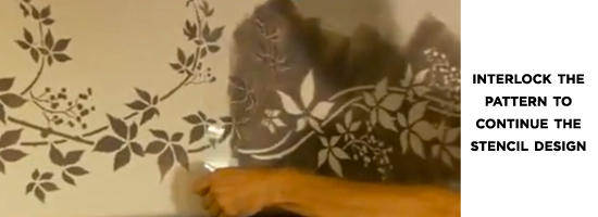 Interlock the pattern to continue painting the stencil design around the room