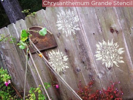 Use Cutting Edge Stencils' Chrysanthemum Grande with sidewalk chalk on a wood fence!