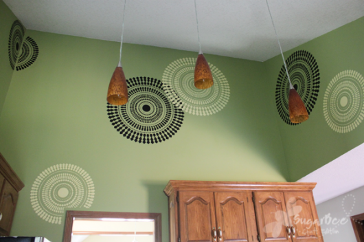 Awesome kitchen renovation using the Funky Wheel design above the kitchen cabinets.