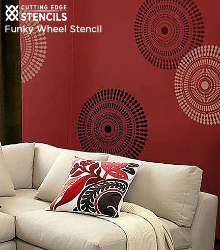 Funky Wheel Wall Stencil from Cutting Edge Stencils looks amazing on red wall