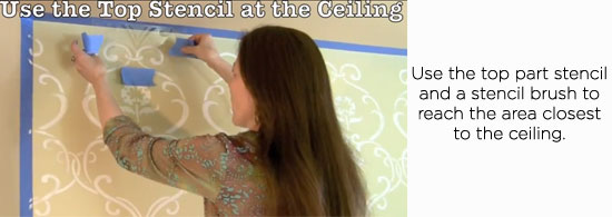 Use the top part stencil and a stencil brush to reach the area closest to the ceiling.