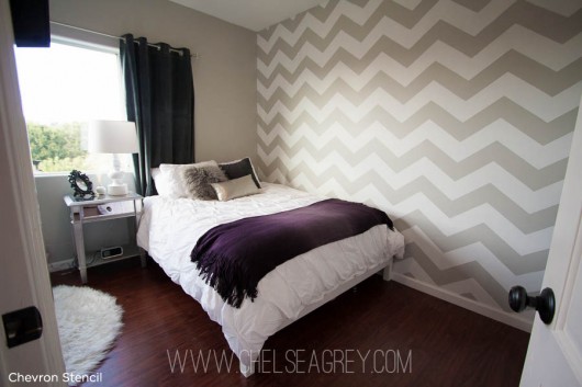 Love this! Beautiful chevron stenciled bedroom idea. The chevron striped pattern makes the accent wall pop.