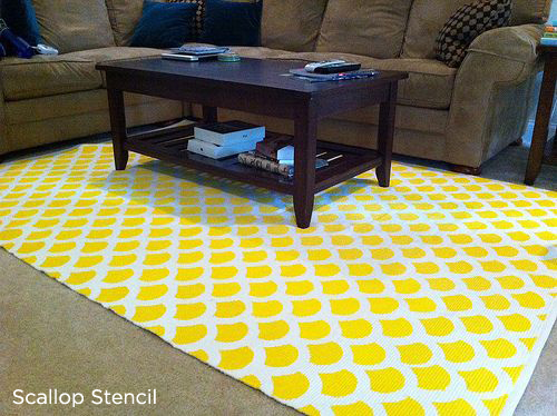 Beautiful scallop stenciled rug that adds a pop of color to this space!