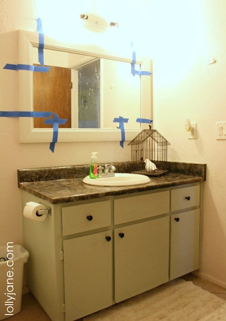 This is what the bathroom looked like before Kelli from Lolly Jane used the Harmony Damask Stencil in her Bathroom makeover.