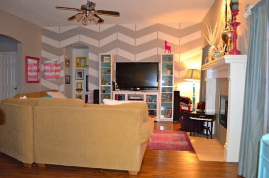 Use the Herringbone Stencil from Cutting Edge Stencils to get a similar look. http://www.cuttingedgestencils.com/herringbone-stencil-pattern.html