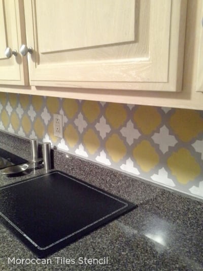 A stenciled kitchen backsplash using the Moroccan Tiles pattern from Cutting Edge Stencils. http://www.cuttingedgestencils.com/moroccan-tiles-wall-pattern.html