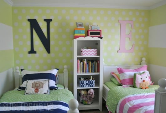 A green stenciled kids bedroom using the Polka Dot Allover pattern from Cutting Edge Stencils. http://www.cuttingedgestencils.com/polka-dots-stencils-nursery.html