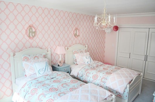 This is a coral and pink Rabat Allover stenciled little girl's nursery. http://www.cuttingedgestencils.com/moroccan-stencil-pattern-3.html