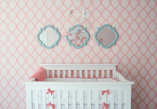 This is a coral and pink Rabat Allover stenciled little girl's nursery. http://www.cuttingedgestencils.com/moroccan-stencil-pattern-3.html