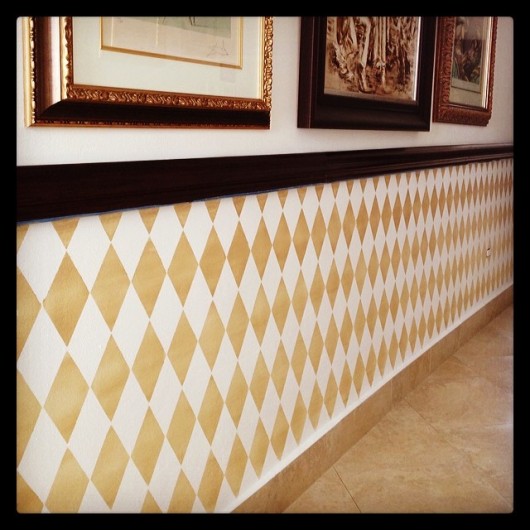 A gold stenciled accent wall using the Harlequin Allover pattern. http://www.cuttingedgestencils.com/harlequin-stencil-pattern.html