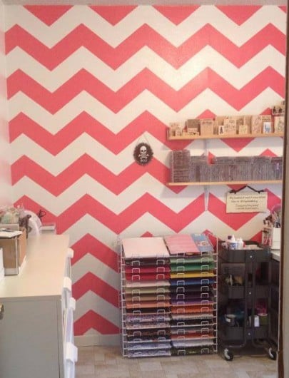 A stenciled accent wall in a craft room using the Chevron Allover Stencil pattern. http://www.cuttingedgestencils.com/chevron-stencil-pattern.html