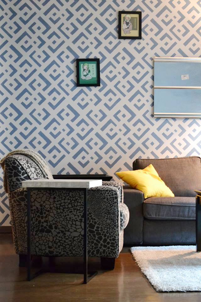 A diy blue stenciled accent wall using the African Kuba Allover Stencil pattern from Cutting Edge Stencils. http://www.cuttingedgestencils.com/african-kuba-stencil-kim-myles.html