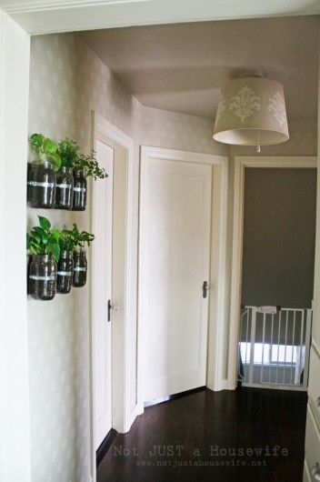 A Polka Dot Allover stenciled hallway. http://www.notjustahousewife.net/2012/01/my-hallway-has-me-seeing-spots.html