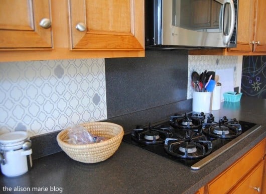 A DIY stenciled kitchen backsplash using the Rabat Craft pattern. http://www.cuttingedgestencils.com/rabat-furniture-fabric-stencil.html