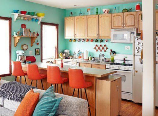 A turquoise and tangerine kitchen spotted on Apartment Therapy. http://www.pinterest.com/pin/288160076132091183/