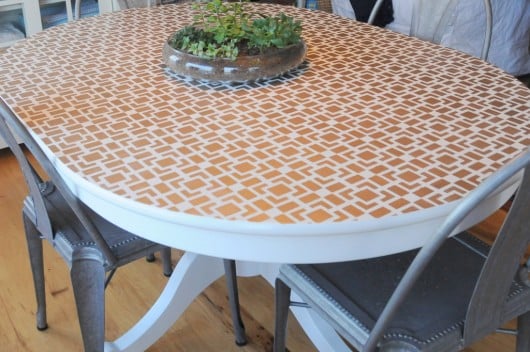 A DIY stenciled table using the Outside of the Box craft stencil in gold. http://www.cuttingedgestencils.com/geometric-small-stencil.html