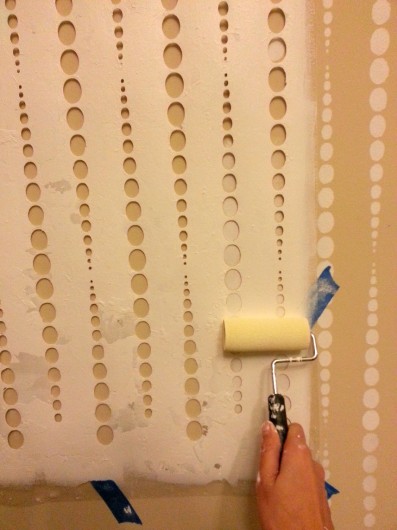 Stenciling a beige bedroom with the Beads Allover Stencil pattern. http://www.cuttingedgestencils.com/beads-wall-stencil-pattern.html