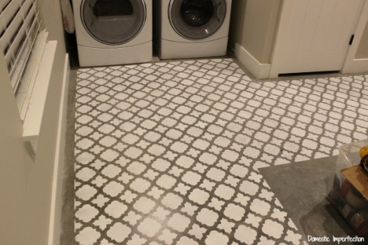 A DIY stenciled cement floor in a laundry room using the Moroccan Tiles pattern. http://www.cuttingedgestencils.com/moroccan-tiles-wall-pattern.html