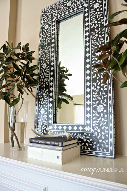 A DIY stenciled mirror using the Indian Inlay stencil pattern. http://www.cuttingedgestencils.com/indian-inlay-stencil-furniture.html