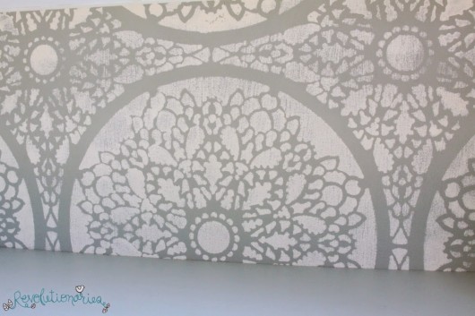 Stenciled the Charlotte Allover stencil pattern on a bookshelf.  http://www.cuttingedgestencils.com/charlotte-allover-stencil-pattern.html