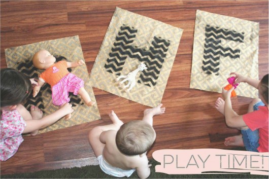 A DIY stenciled play mat using the Chevron Letter Stencils. http://www.cuttingedgestencils.com/chevron-letter-stencil-baby-names-for-walls.html 