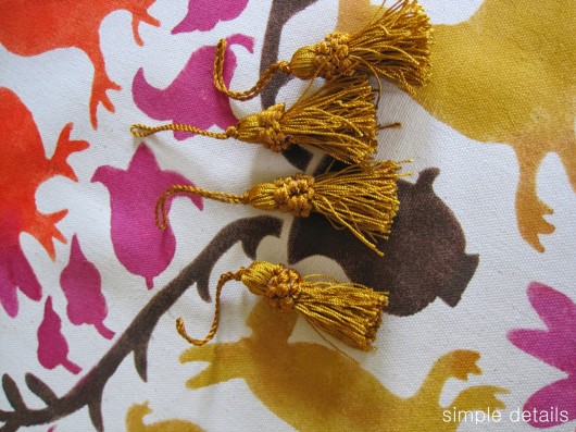 Adding tassels to the Otomi Paint-A-Pillow kit. http://paintapillow.com/index.php/otomi-roosters-paint-a-pillow-kit.html 