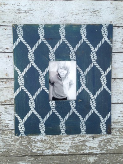 A DIY stenciled wooden frame using the Perfect Catch craft stencil in indigo blue. https://www.etsy.com/listing/181754180/nautical-rope-wood-picture-frame-for?ref=shop_home_active_6