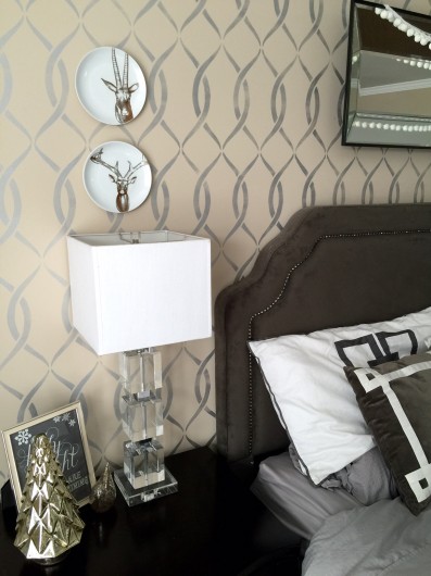 A DIY stenciled bedroom using the Entwined Allover Stencil on an accent wall in metallic silver. http://www.cuttingedgestencils.com/stencil-pattern-2.html