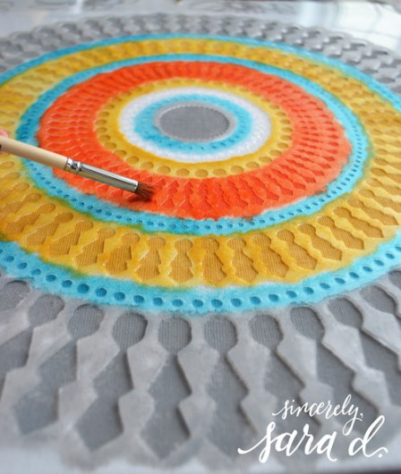 Painting a DIY accent pillow using Paint-A-Pillow and the Funky Wheel stencil. http://paintapillow.com/index.php/funky-wheel-paint-a-pillow-kit.html