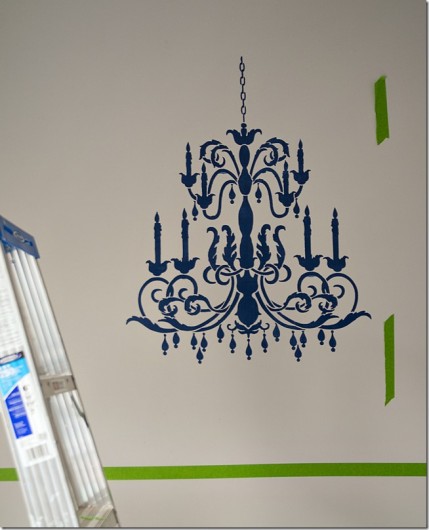 Painting the Chandelier wall stencil in blue in a bedroom on an accent wall. http://www.cuttingedgestencils.com/chandelier-stencil-decal.html