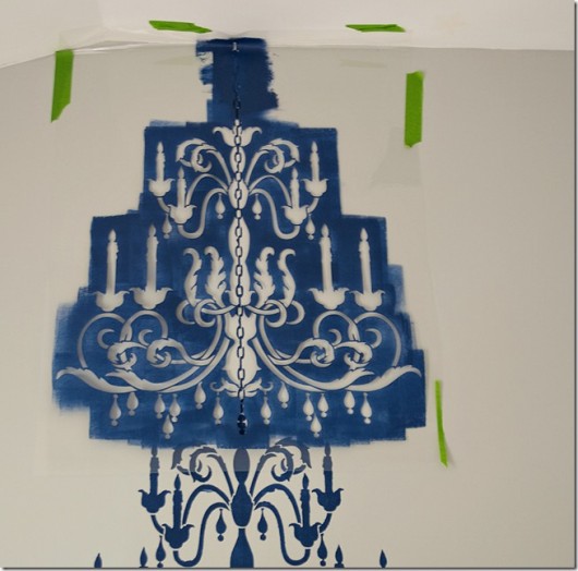 Painting the Chandelier wall stencil in blue in a bedroom on an accent wall. http://www.cuttingedgestencils.com/chandelier-stencil-decal.html