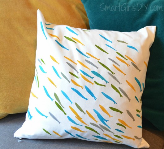 A DIY stenciled accent pillow using the Fish School Paint-A-Pillow stencil kit. http://paintapillow.com/index.php/fish-school-paint-a-pillow-kit.html