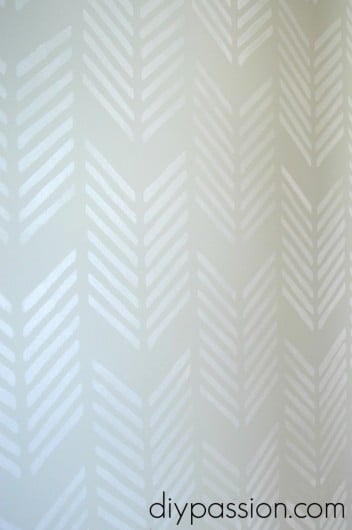 A DIY white stenciled hallway makeover using the Drifting Arrows Allover stencil. http://www.cuttingedgestencils.com/drifting-arrows-stencil-pattern-diy-decor.html