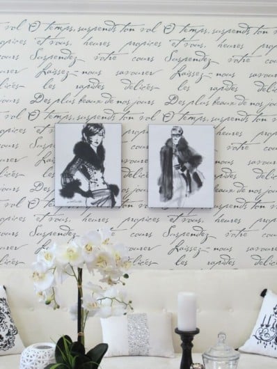 A DIY stenciled accent wall in a French Glam living room using the French Poem Allover Stencil. http://www.cuttingedgestencils.com/french-poem-typography-letter-stencil.html