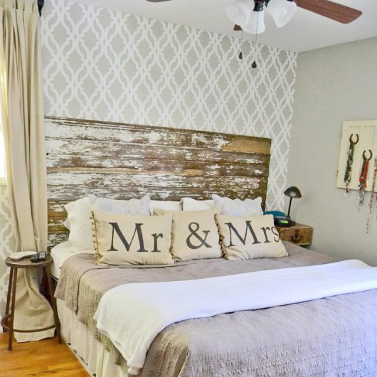 A gray and white DIY stenciled accent wall in a bedroom using the Tamara Trellis Allover pattern. http://www.cuttingedgestencils.com/tamara-trellis-allover-wall-stencils.html