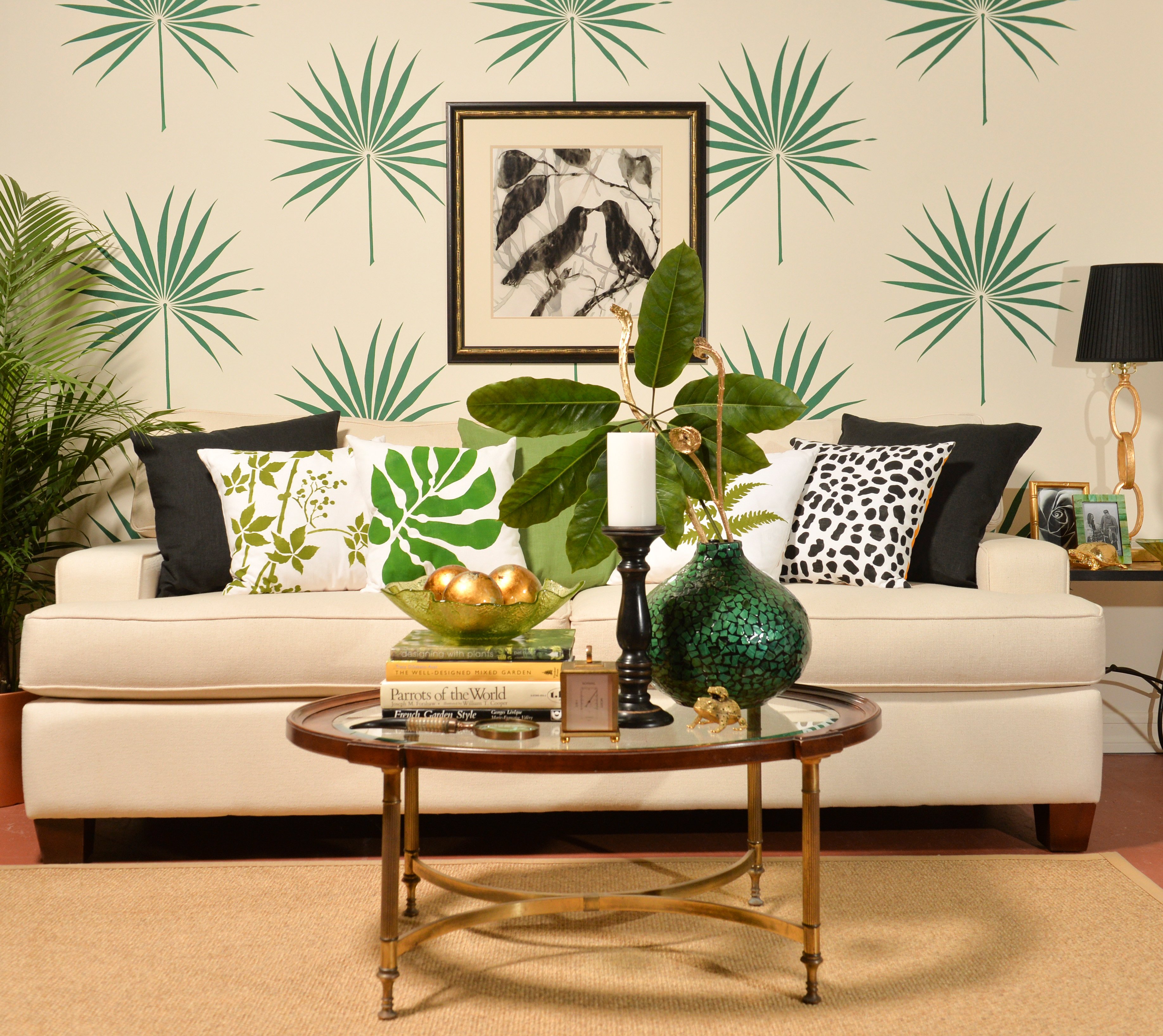 A DIY stenciled living room accent wall using the Palmetto Leaf Wall Art Stencil for the tropical home decor trend. http://www.cuttingedgestencils.com/palm-leaf-stencil-palmetto-wall-decor.html