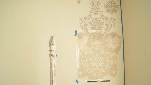 Stenciling a DIY accent wall in a bedroom using the Gabrielle Damask Stencil. http://www.cuttingedgestencils.com/damask-stencil-3.html