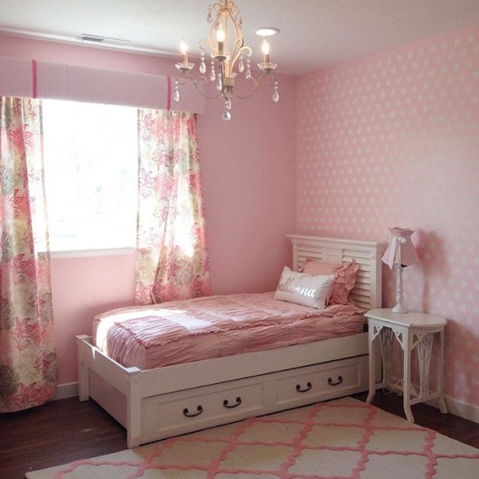 A Polka Dot Allover stenciled accent wall in pink and white in a girl's bedroom. http://www.cuttingedgestencils.com/polka-dots-stencils-nursery.html