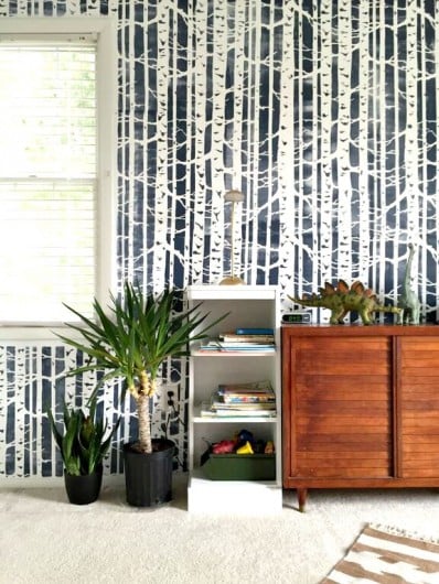 A DIY stenciled boys bedroom accent wall using the Birch Forest Allover Stencil in navy. http://www.cuttingedgestencils.com/allover-stencil-birch-forest.html