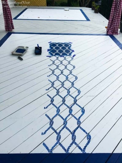 Stenciling an outdoor rug using the Perfect Catch Allover Stencil. http://www.cuttingedgestencils.com/perfect-catch-stencil-beach-decor.html