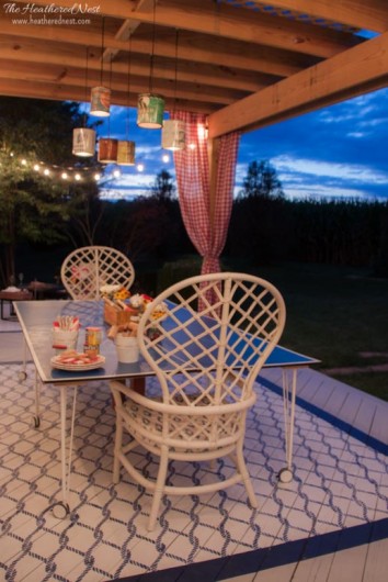 A DIY stenciled outdoor faux rug on a deck using the Perfect Catch Allover Stencil. http://www.cuttingedgestencils.com/perfect-catch-stencil-beach-decor.html
