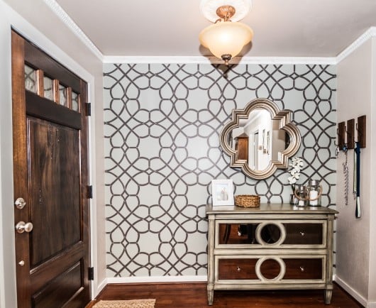 A DIY stenciled accent wall in an entryway using the Coco Trellis Allover Stencil. http://www.cuttingedgestencils.com/coco-trellis-allover-pattern-stencil.html