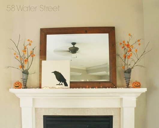 DIY stenciled Halloween mantel art using the Crow Craft Stencil on a canvas. http://www.cuttingedgestencils.com/crow-stencil-halloween-accent-pillows-trick-or-treat-totes.html