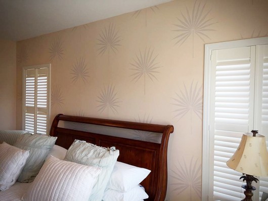 A DIY stenciled bedroom accent wall using the Palmetto Leaf Wall Art Stencil. http://www.cuttingedgestencils.com/palm-leaf-stencil-palmetto-wall-decor.html