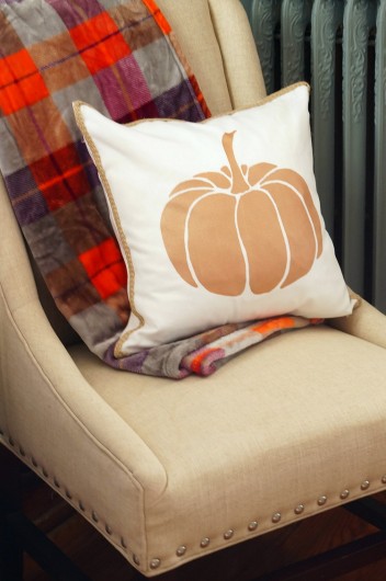 A DIY stenciled Fall accent pillow using the Pumpkin Stencil Kit from Cutting Edge Stencils. http://www.cuttingedgestencils.com/pumpkin-stencils-halloween-throw-pillows-diy-home-decor.html