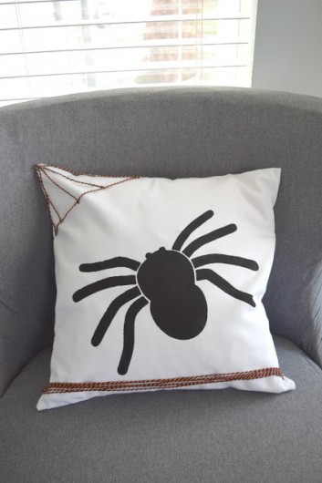 A DIY stenciled Halloween accent pillow using the Spider Stencil Kit. http://www.ourhousenowahome.com/2015/10/october-create-and-share-spider-pillow.html