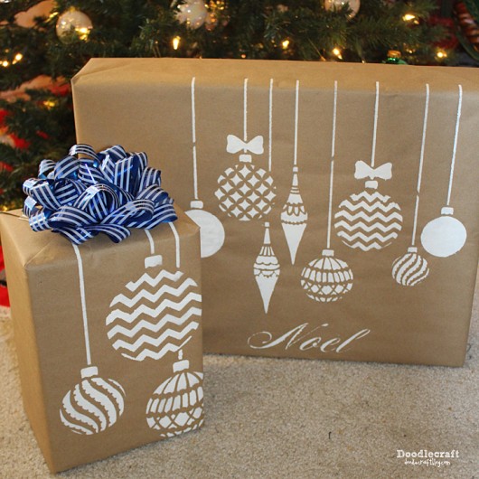 DIY stenciled gift wrap using the Christmas Ornaments Stencil from Cutting Edge Stencils and Kraft paper. http://www.cuttingedgestencils.com/diy-christmas-decor-craft-and-furniture-stencils.html