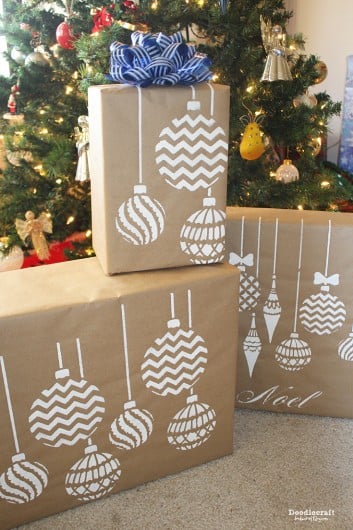 DIY stenciled gift wrap using the Christmas Ornaments Stencil from Cutting Edge Stencils and Kraft paper. http://www.cuttingedgestencils.com/diy-christmas-decor-craft-and-furniture-stencils.html