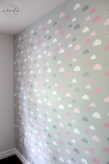 A DIY stenciled accent wall in a nursery using the Cloud Allover Stencils. http://www.cuttingedgestencils.com/clouds-allover-stencil-pattern-for-walls.html